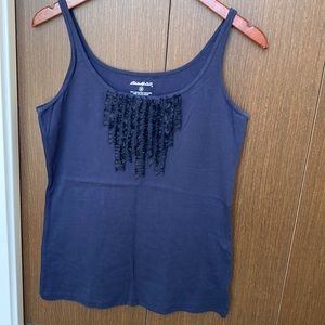 Navy Eddie Bauer medium cotton tank with ruffle detail.